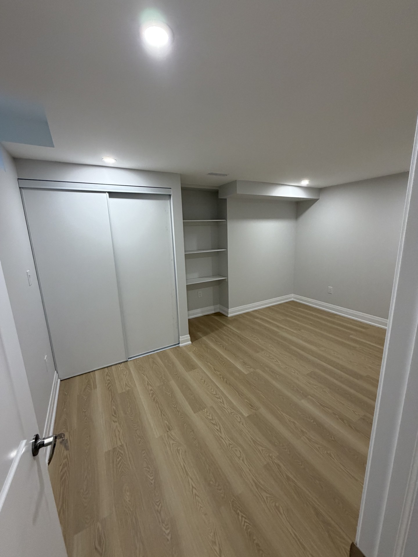 Custom basement craftsmanship and feature wall execution