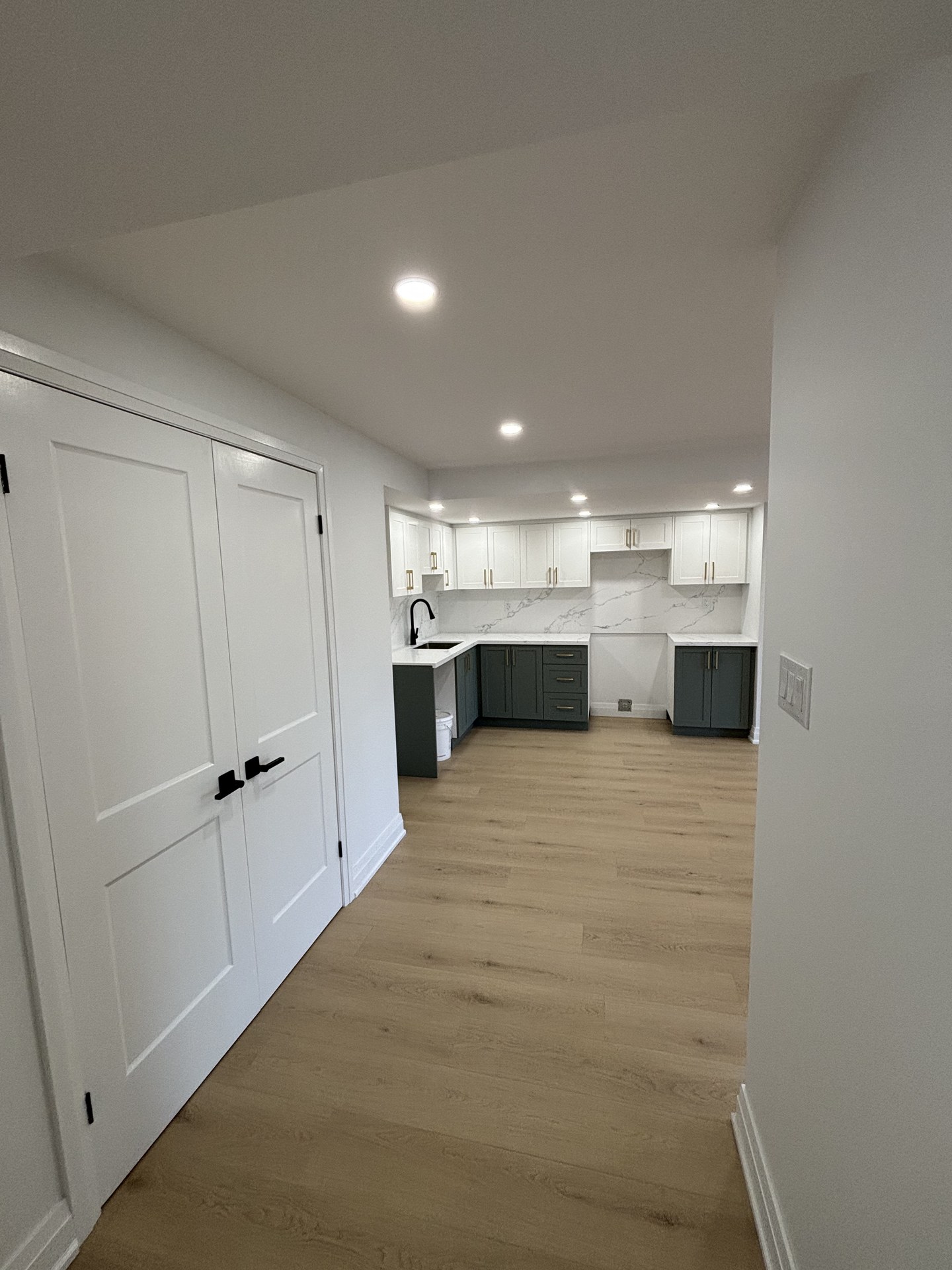 Luxury basement flooring and interior finishes by WEIVA Homes