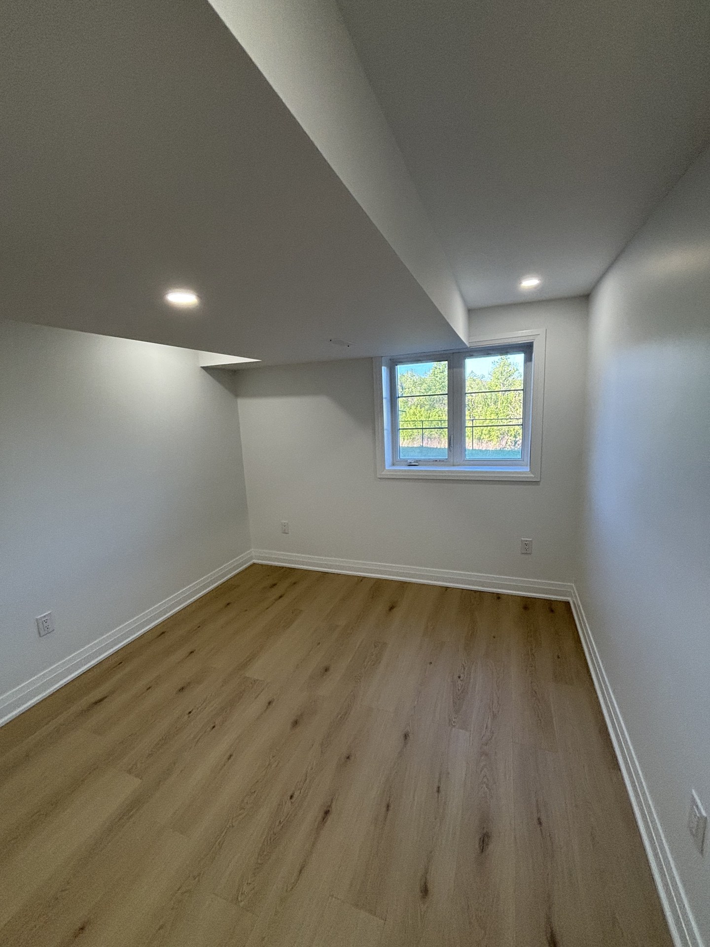 Spacious finished basement living area walkthrough