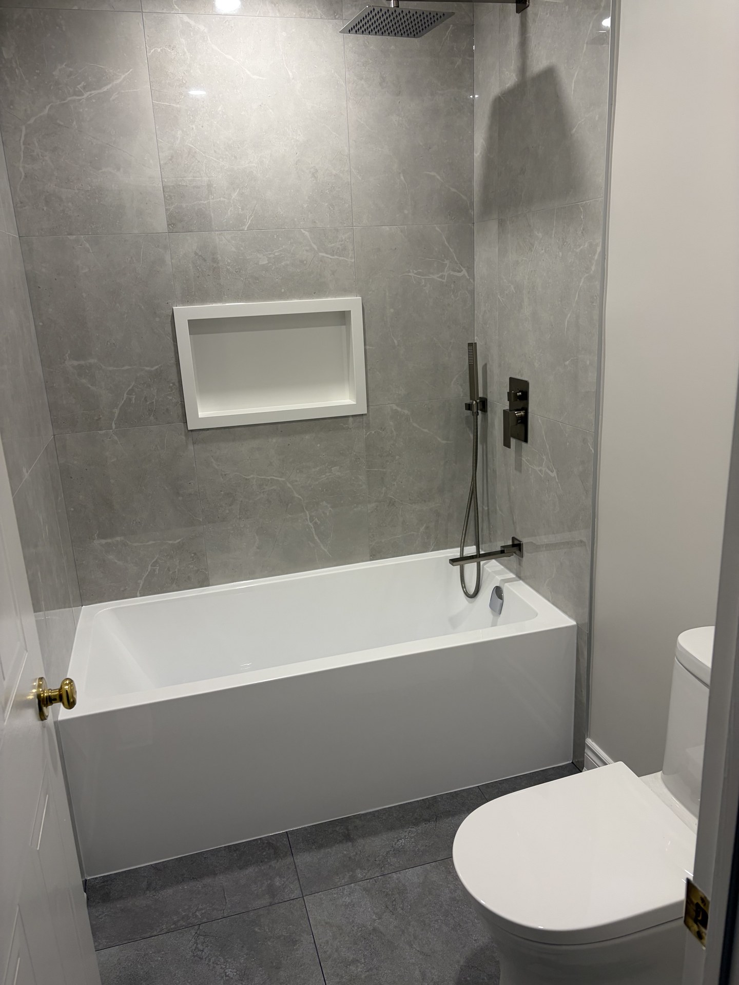 Modern powder room vanity and accent wall design